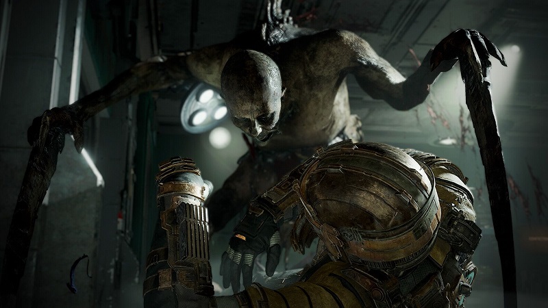Image from Dead Space showing a downed Isaac Clarke about to be attacked by a Necromorph.