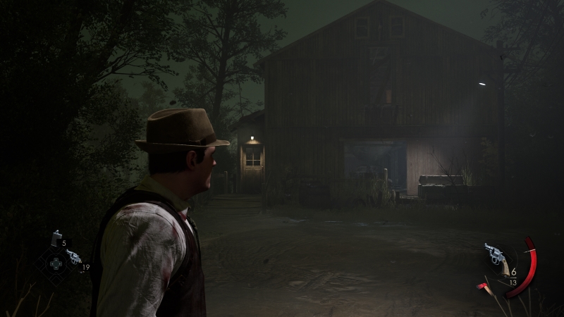 Alone In The Dark: Edward looking towards an old barn that's lit by a dim light.