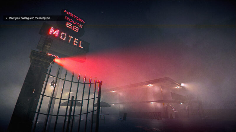 Nightmare Shift: a red spotlight shines outside a dark and grisly looking motel.