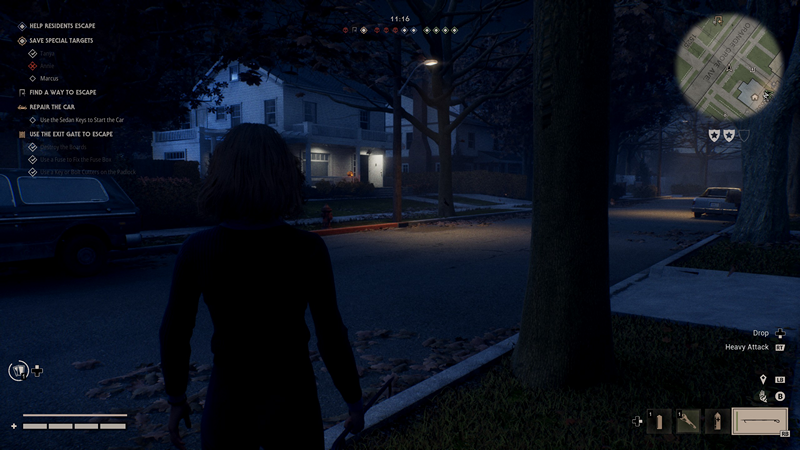 Halloween: The silhouette of a female character stands still in a street at night.