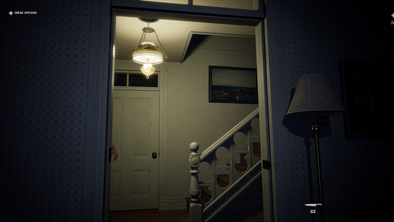 Halloween: an in-game shot of a staircase to a hallway, while a hand can just about be seen coming into frame.