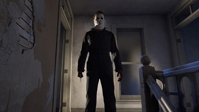 Halloween The Game: Michael Myers in his iconic white mask stands at the top of some stairs.